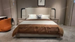 Light Beige Leather Upholstered Bed with Wave Quilting, Green Marble Accents & Gold Stainless Steel Hardware